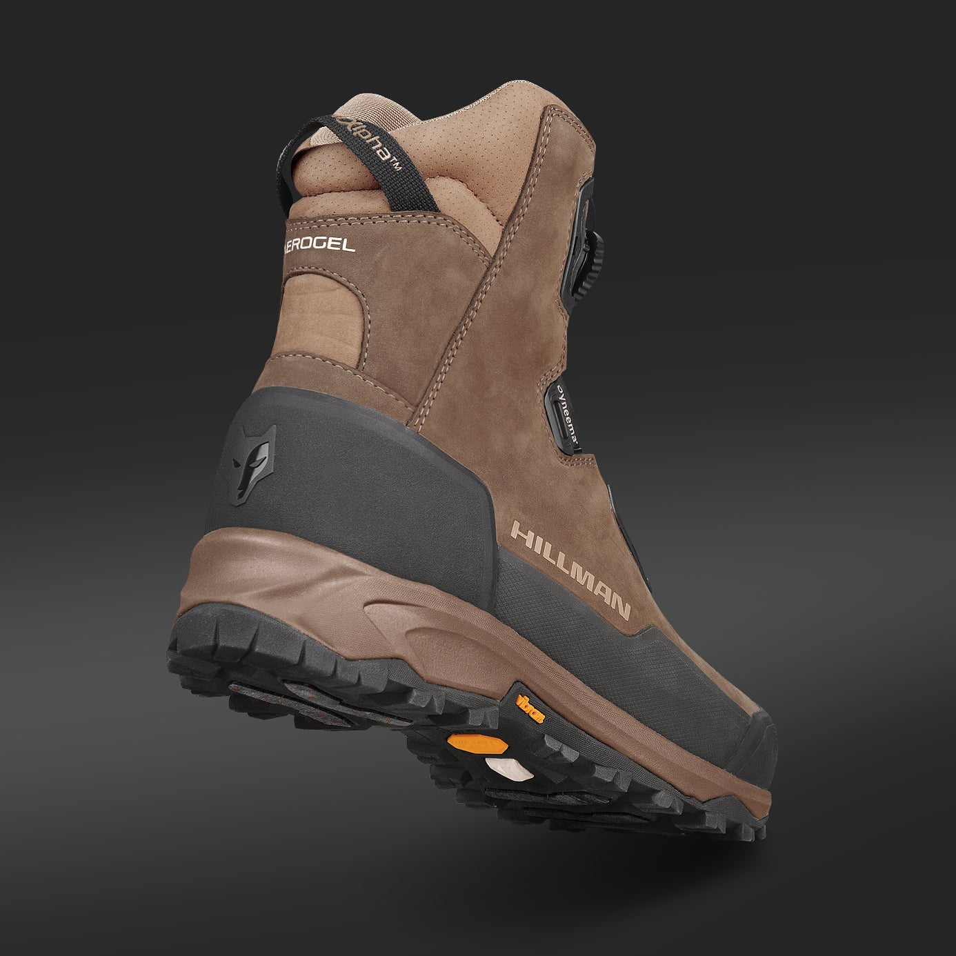 The Hillman® Insulated Hunting Boots – Warmest Waterproof Aerogel™ 2.0 feature brown and black waterproof leather, rugged tread, orange traction detail, pull tab, and raised heel for extreme cold-weather protection against a dark gradient backdrop.