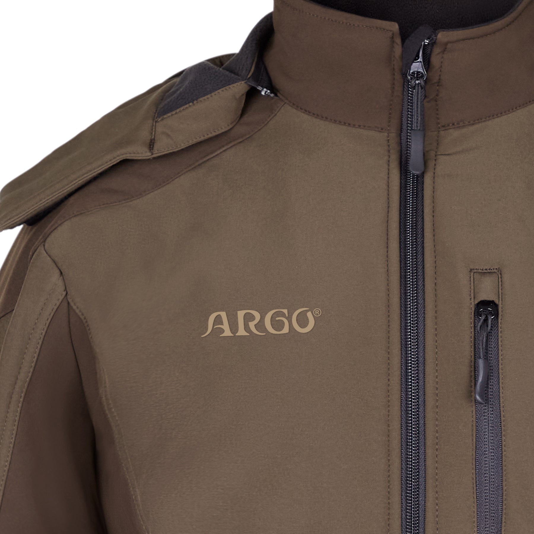 Close-up of the upper front of a brown Hunting Jacket SOFTSHELL ARGO® by Hillman®, showing the brand name printed on the left chest, a vertical zippered pocket, visible seams, and wind-resistant material.