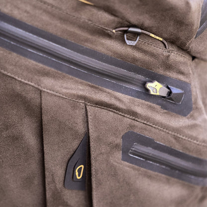 Close-up of a brown suede-like jacket with waterproof zipper, black and gold pull tab, detailed stitching, and black accents—pairs perfectly with HILLMAN GEAR Insulated Hunting Pants 6OL Cold Weather Waterproof Bibs for outdoor adventures.