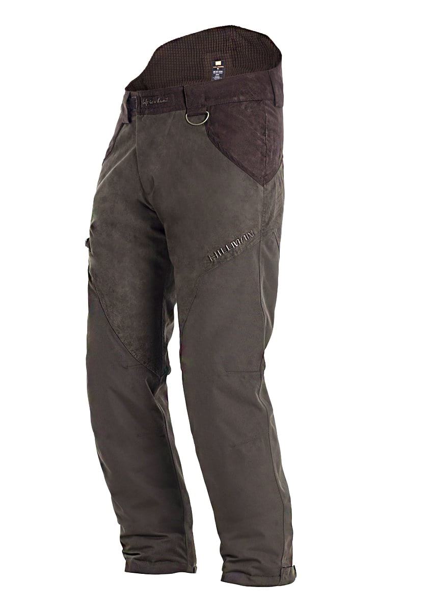 Hillman® Waterproof Insulated Hunting Pants | Fusion: dark-colored, heavy-duty pants with reinforced knees/thighs, high waistband, D-ring on the front right, and visible stitching. Shown on a plain white background.