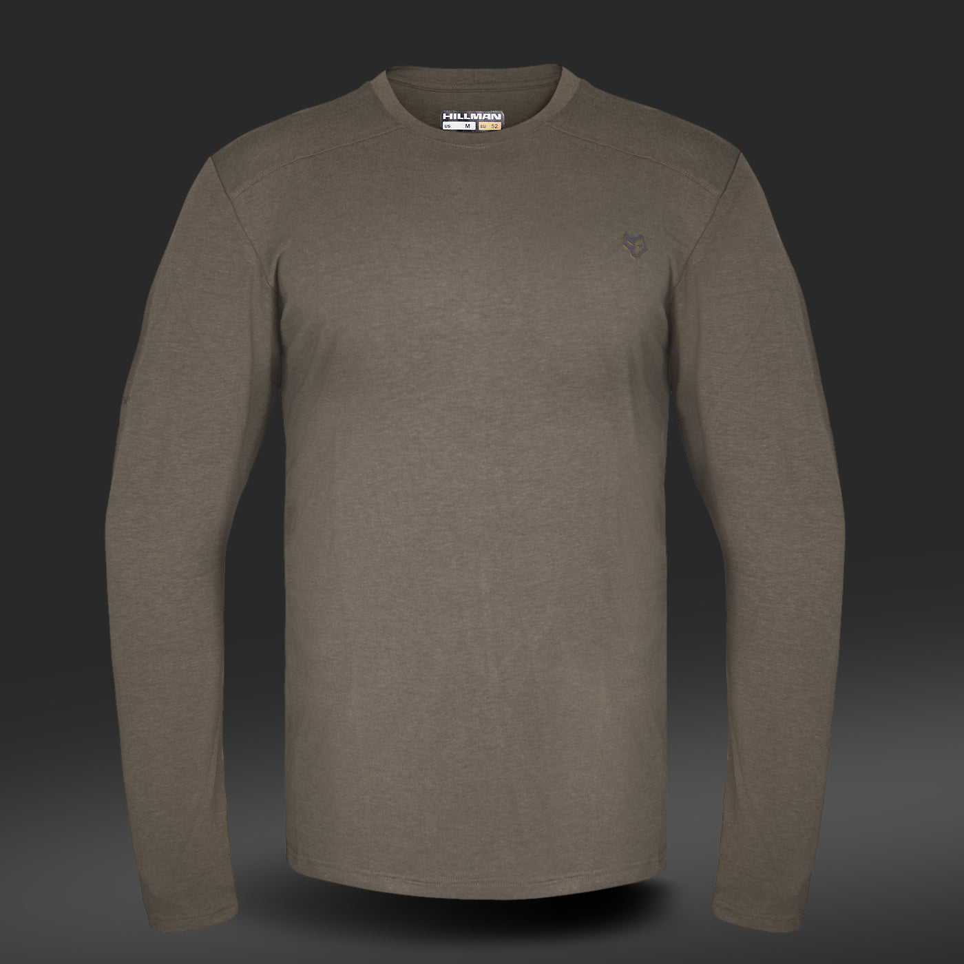 The HILLMAN 1UL Bamboo Long Sleeve Hunting T-Shirt, an ultralight all-season base layer in olive green, is shown on a dark gray background. Made from bamboo fiber for better moisture control, it features a small embroidered logo on the left chest.