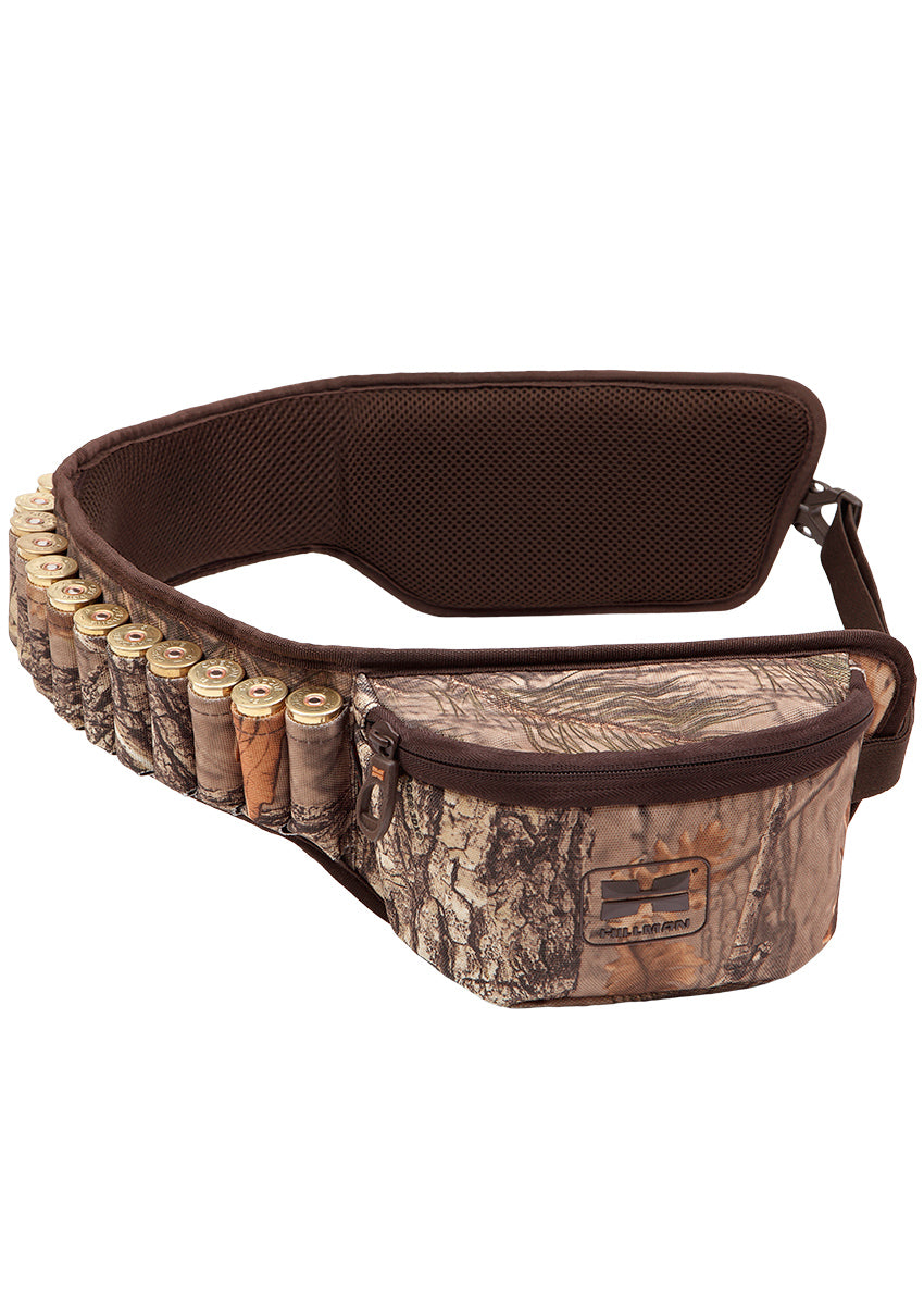 Introducing the Hillman® Boxbelt: made from waterproof, durable fabric, this camouflage belt is perfect for holding shotgun shells. It has multiple elastic loops, a small zippered pouch, and an adjustable strap with a buckle—ideal for outdoor adventures.