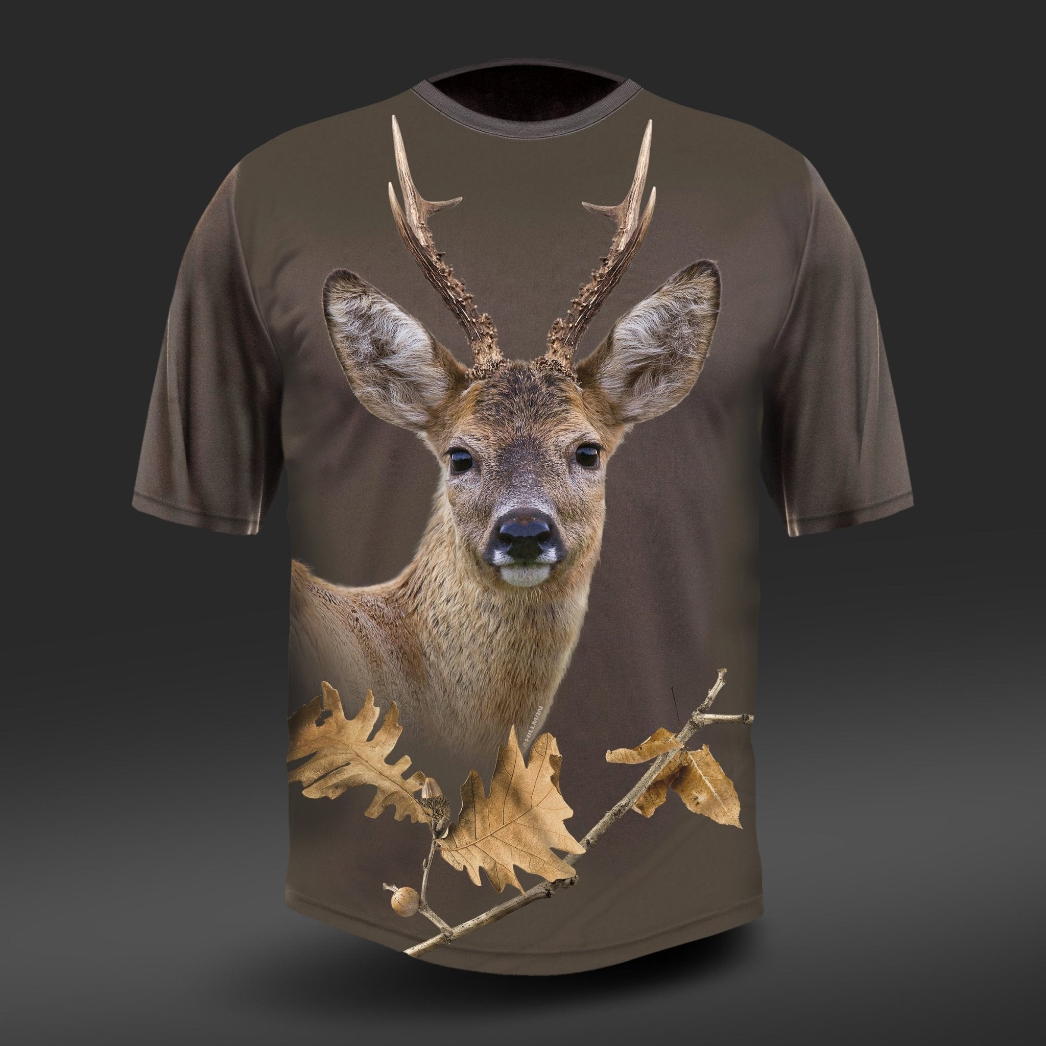 The Hillman® T-shirt Roe Deer DGT Cotton Short Sleeve is a luxurious brown tee made from Egyptian cotton, featuring a realistic deer head with antlers amid autumn leaves and twigs on a gradient dark gray background, showcasing intricate details through advanced digital print technology.